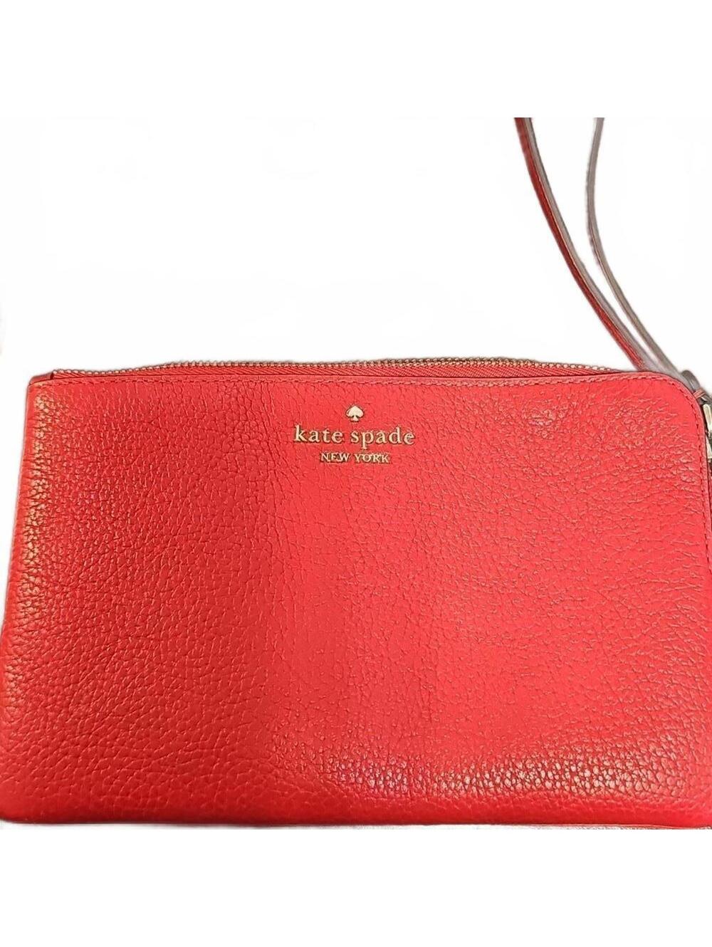 Kate spade wristlet. Pebble Red Leather